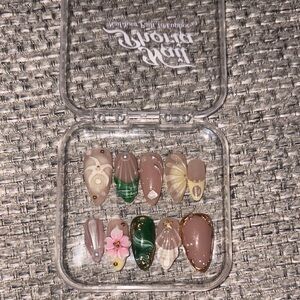 Decorative Press-On Nails with Floral and Geometric Designs